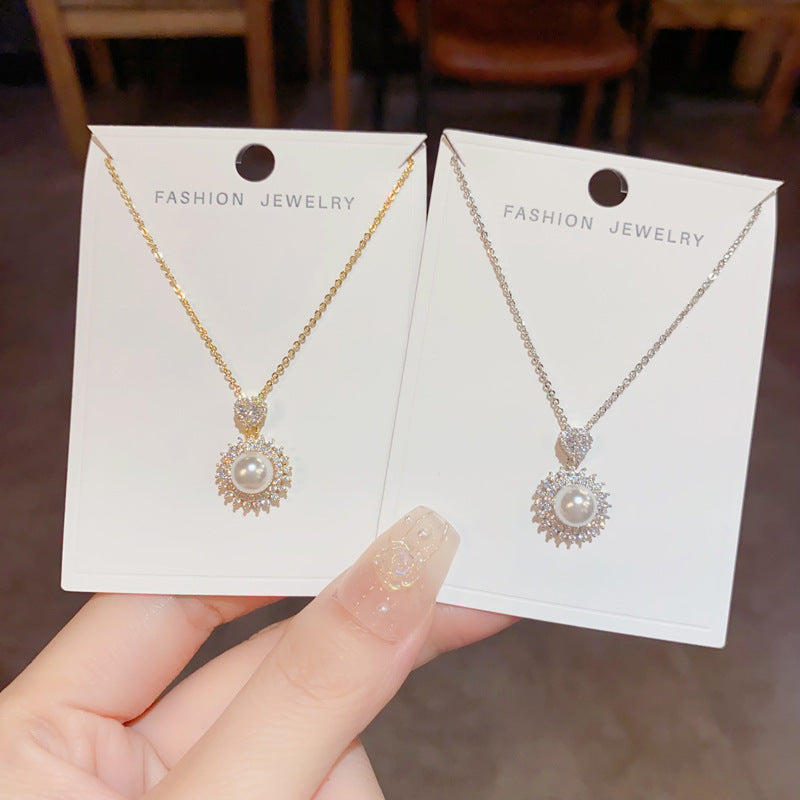珍珠太陽花墜飾項鍊－商品主圖｜https://igowo.tw/