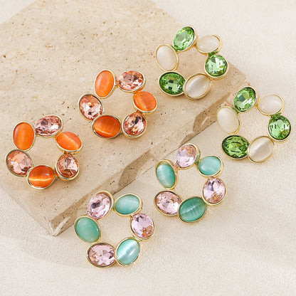 貓眼石幾何鏤空耳環－商品主圖｜https://igowo.tw/