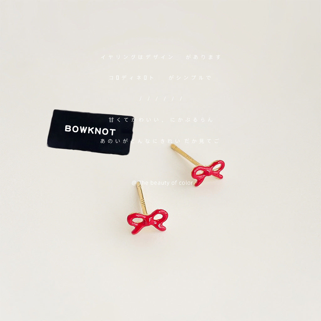 琺瑯蝴蝶結小巧耳釘－商品主圖｜https://igowo.tw/