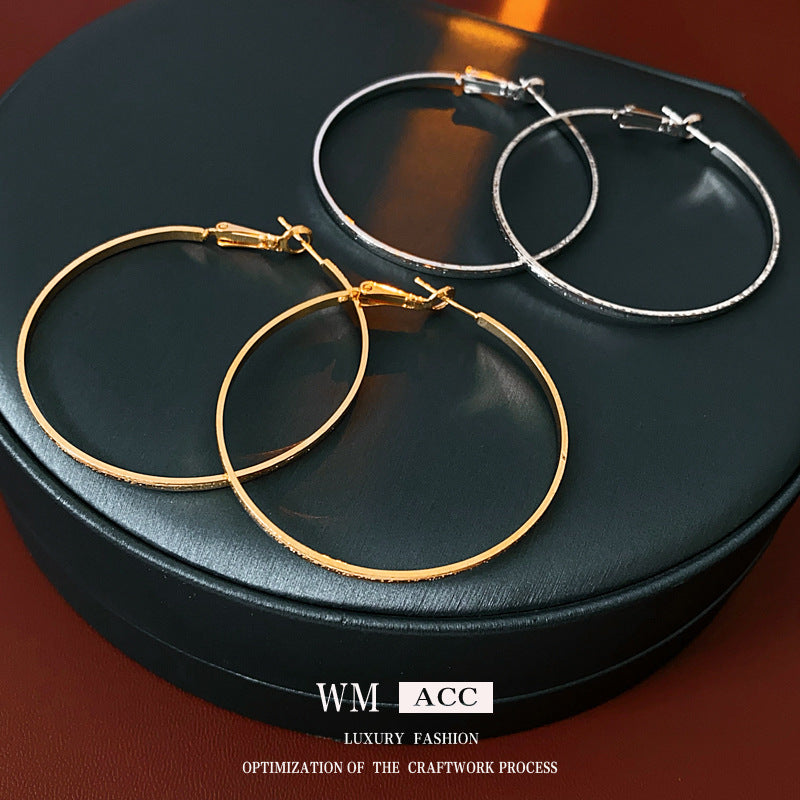 金色銀針圓圈電鍍耳環－商品主圖｜https://igowo.tw/