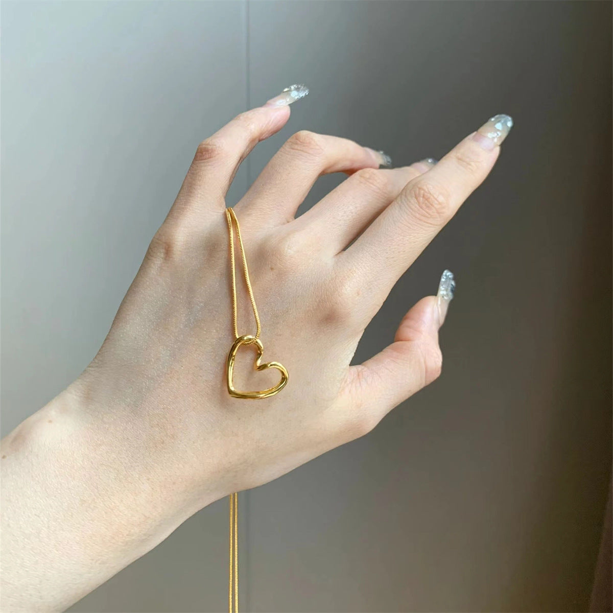不鏽鋼愛心簡約項鍊－項鍊-金色款實拍｜https://igowo.tw/