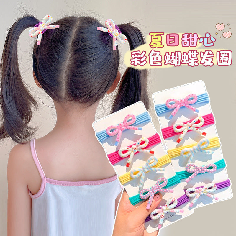 蝴蝶結碎花髮圈－商品主圖｜https://igowo.tw/