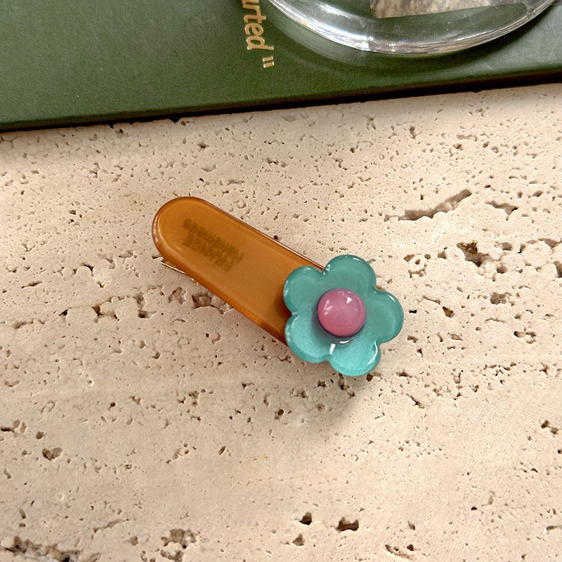 彩色醋酸板材花朵髮夾－藍綠色花朵款細節｜https://igowo.tw/