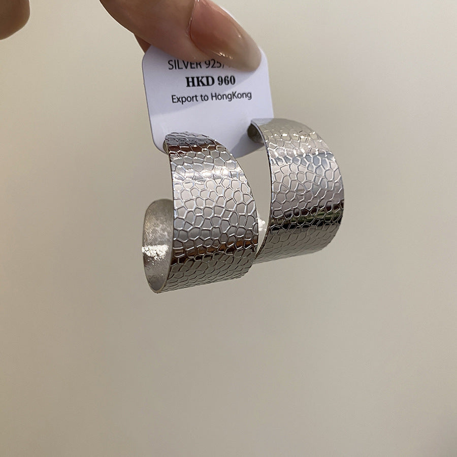 圓形流蘇鏤空耳環－商品主圖｜https://igowo.tw/