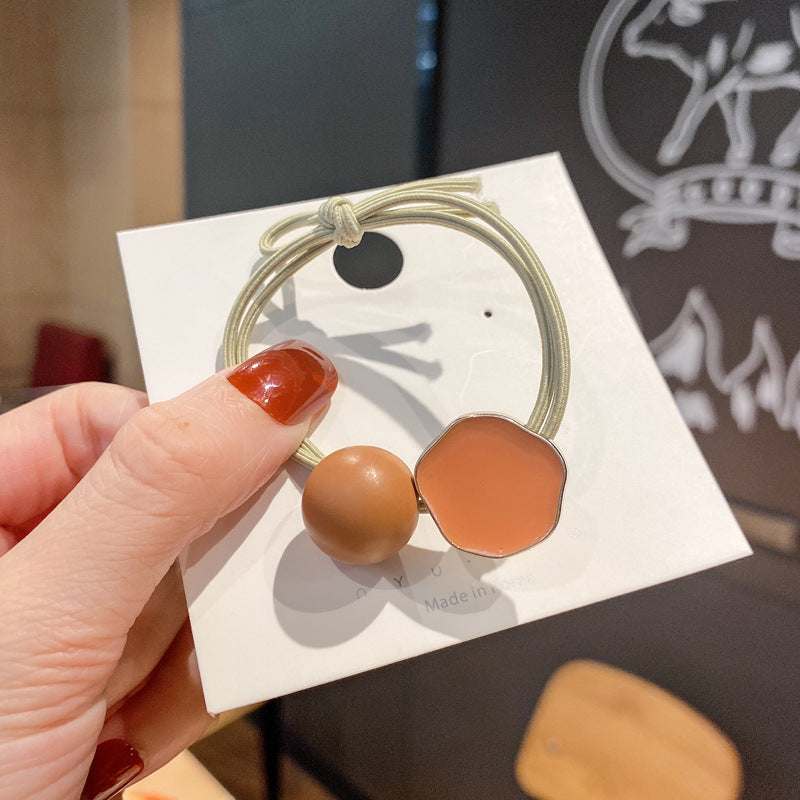 琺瑯貝殼髮圈－橙色貝殼款細節1｜https://igowo.tw/