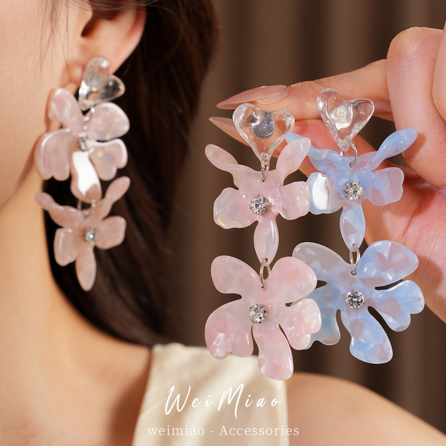 樹脂愛心花朵流蘇耳環－商品主圖｜https://igowo.tw/