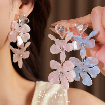 樹脂愛心花朵流蘇耳環－商品主圖｜https://igowo.tw/