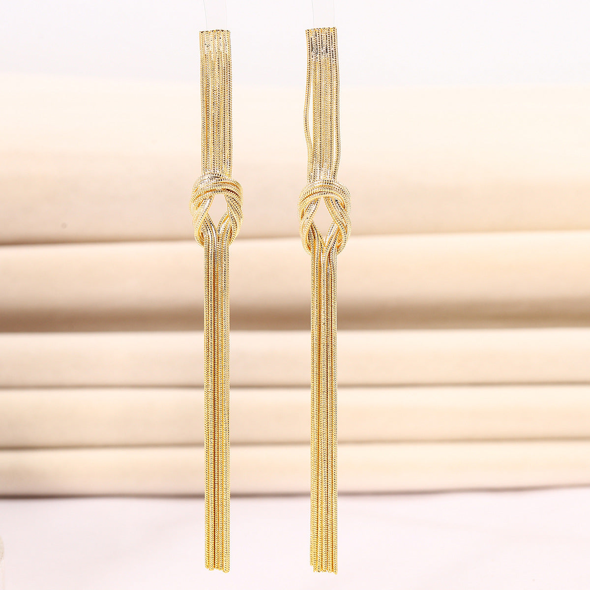 扭結流蘇長版耳環－商品主圖｜https://igowo.tw/