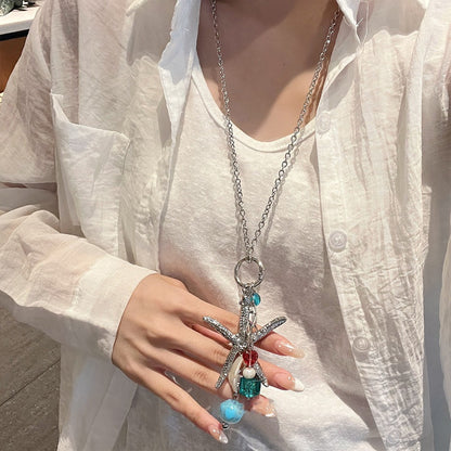 彩色陶瓷海星編織項鍊－#項鍊-咖色-手持小貓款細節｜https://igowo.tw/