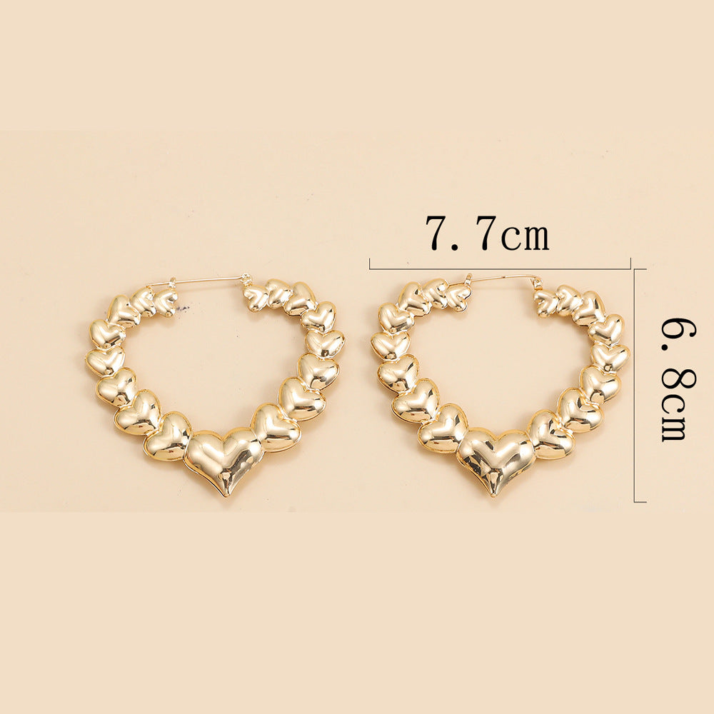 愛心圓圈鏤空誇張耳環