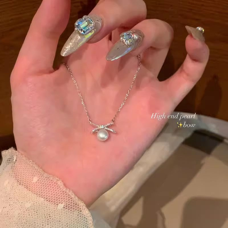 鈦鋼蝴蝶結愛心項鍊－銀款細節｜https://igowo.tw/