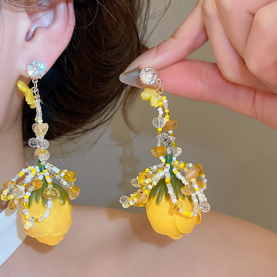 水晶愛心花朵流蘇耳釘－商品主圖｜https://igowo.tw/