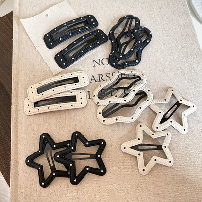 皮革波點星星鏤空髮夾－商品主圖｜https://igowo.tw/