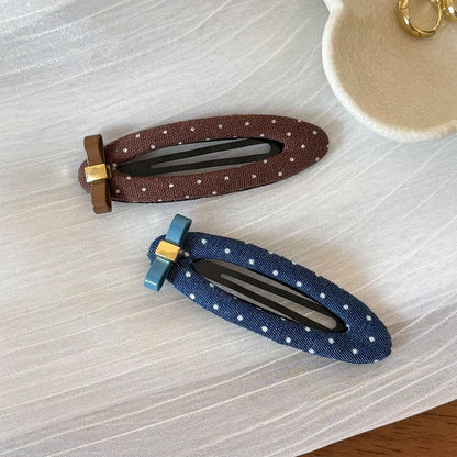 布面波點蝴蝶髮夾－商品主圖｜https://igowo.tw/