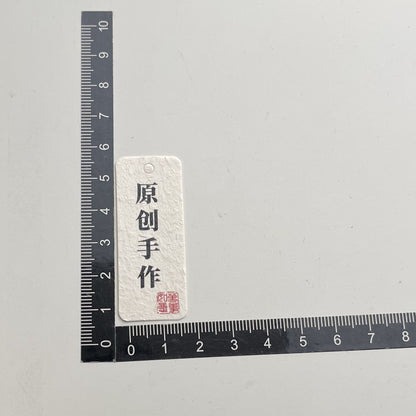 白色誇張耳環