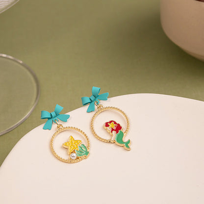 銀針蝴蝶結魚尾耳環－細節特寫1｜https://igowo.tw/