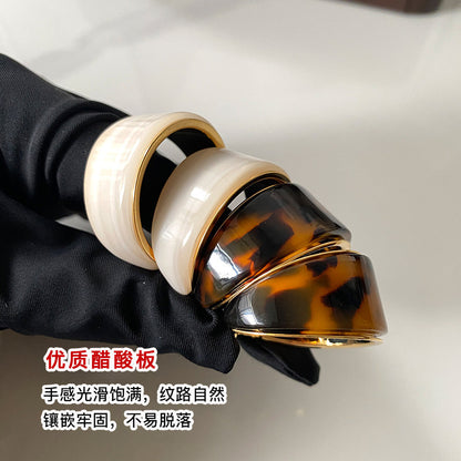 樹脂圓圈耳環－銀針-咖色款實拍｜https://igowo.tw/
