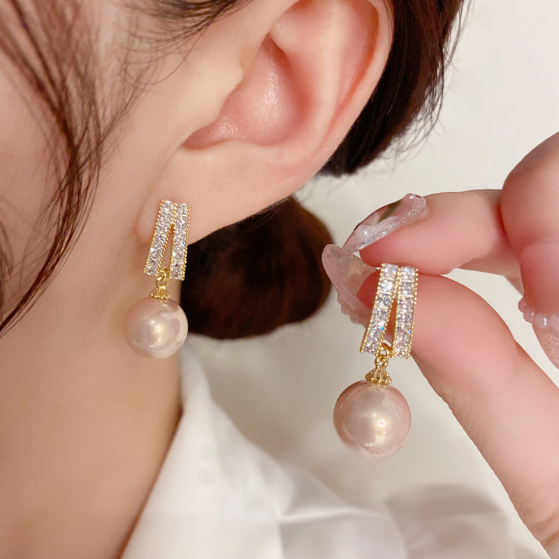 S925珍珠鋯石垂墜微鑲耳環－商品主圖｜https://igowo.tw/