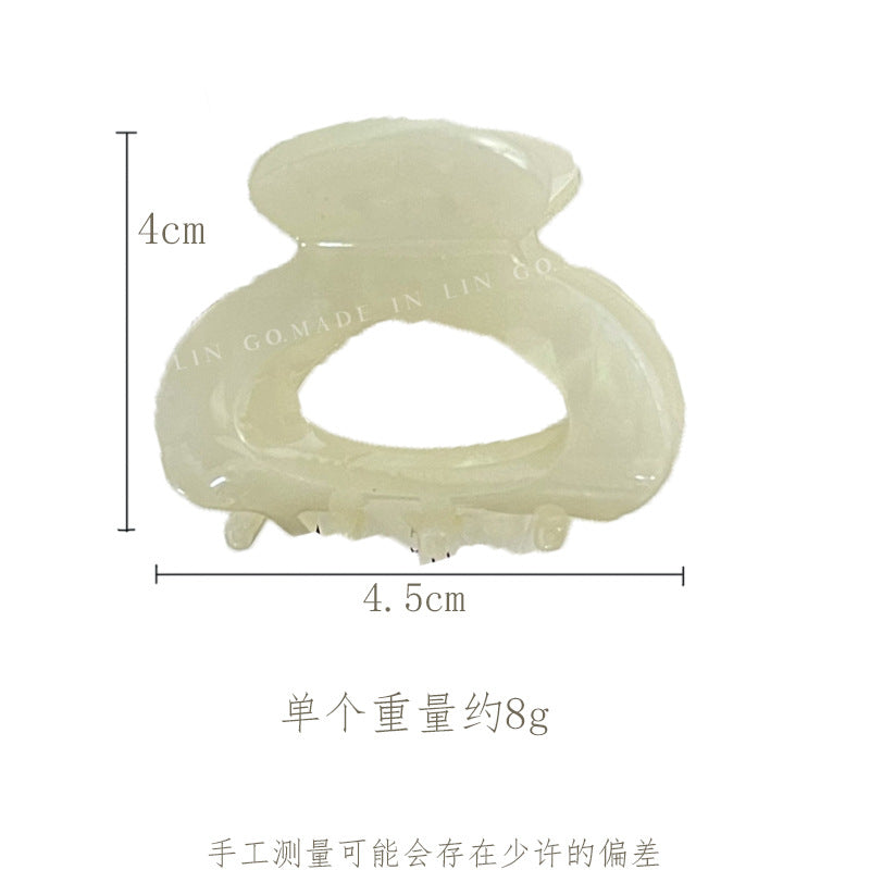 醋酸板材簡約鯊魚夾－淺豹紋款實拍｜https://igowo.tw/