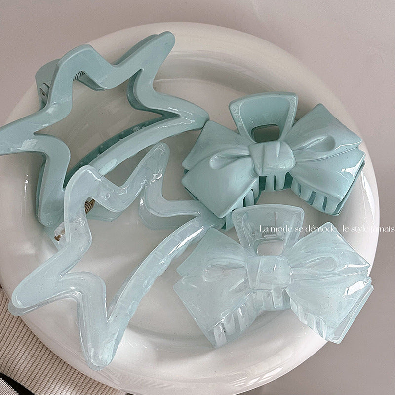 藍色蝴蝶結星星鯊魚夾－商品主圖｜https://igowo.tw/
