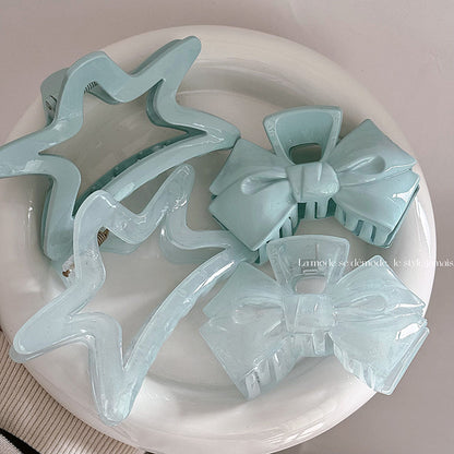 藍色蝴蝶結星星鯊魚夾－商品主圖｜https://igowo.tw/