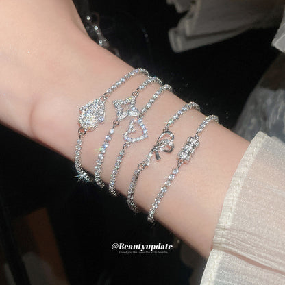 鋯石愛心蝴蝶結髮圈－手鍊-金色-圓形款細節1｜https://igowo.tw/