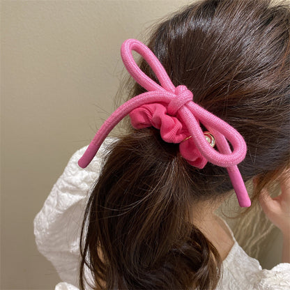 粉色蝴蝶結大腸圈髮圈－綠色腸圈款實拍｜https://igowo.tw/