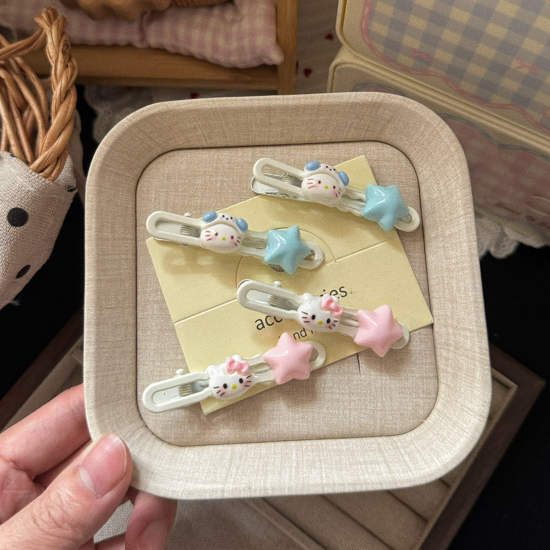 粉色貓咪星星髮夾－商品主圖｜https://igowo.tw/