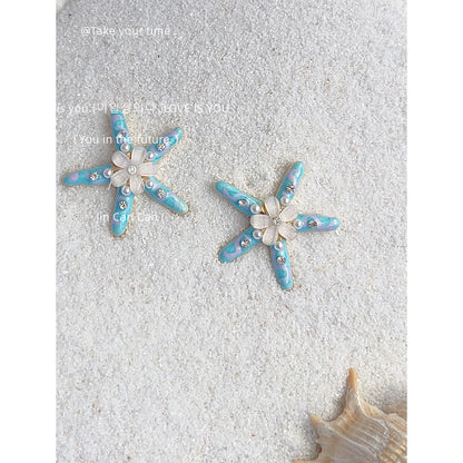珍珠琺瑯海星星星耳釘－商品主圖｜https://igowo.tw/