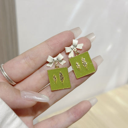 蝴蝶結花朵耳環－細節特寫28｜https://igowo.tw/