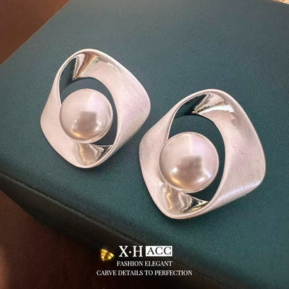 珍珠銀針幾何鏤空耳釘