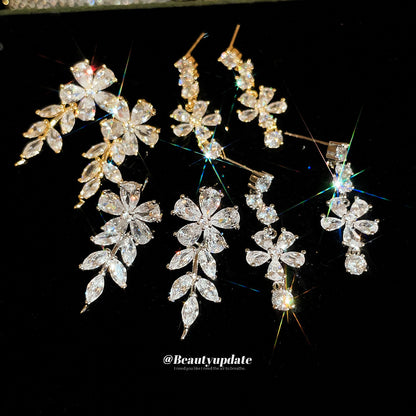 金色鋯石花朵電鍍耳釘－商品主圖｜https://igowo.tw/
