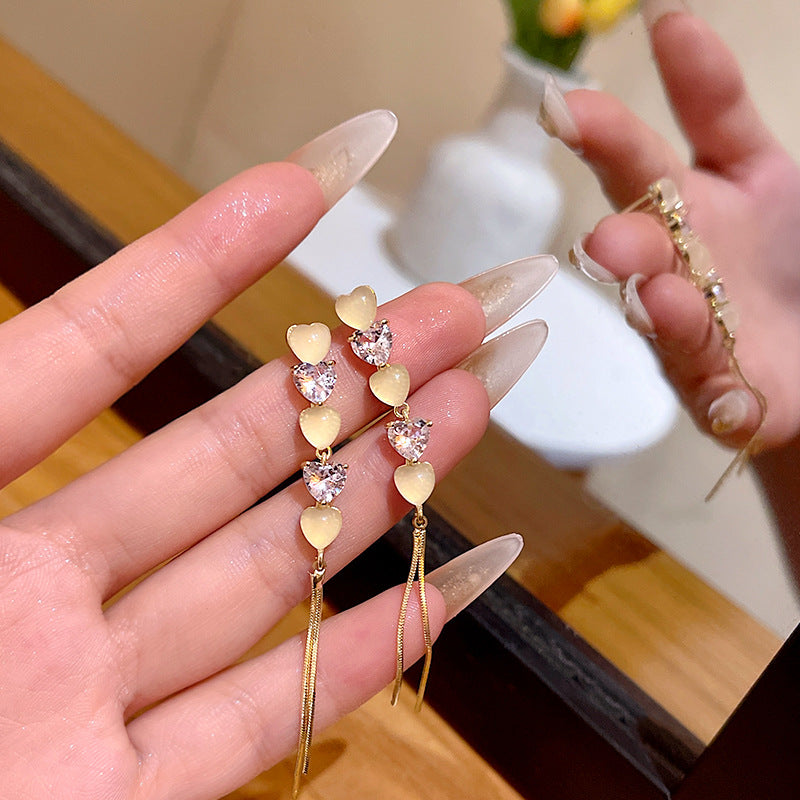 輕奢貓眼石愛心流蘇耳環