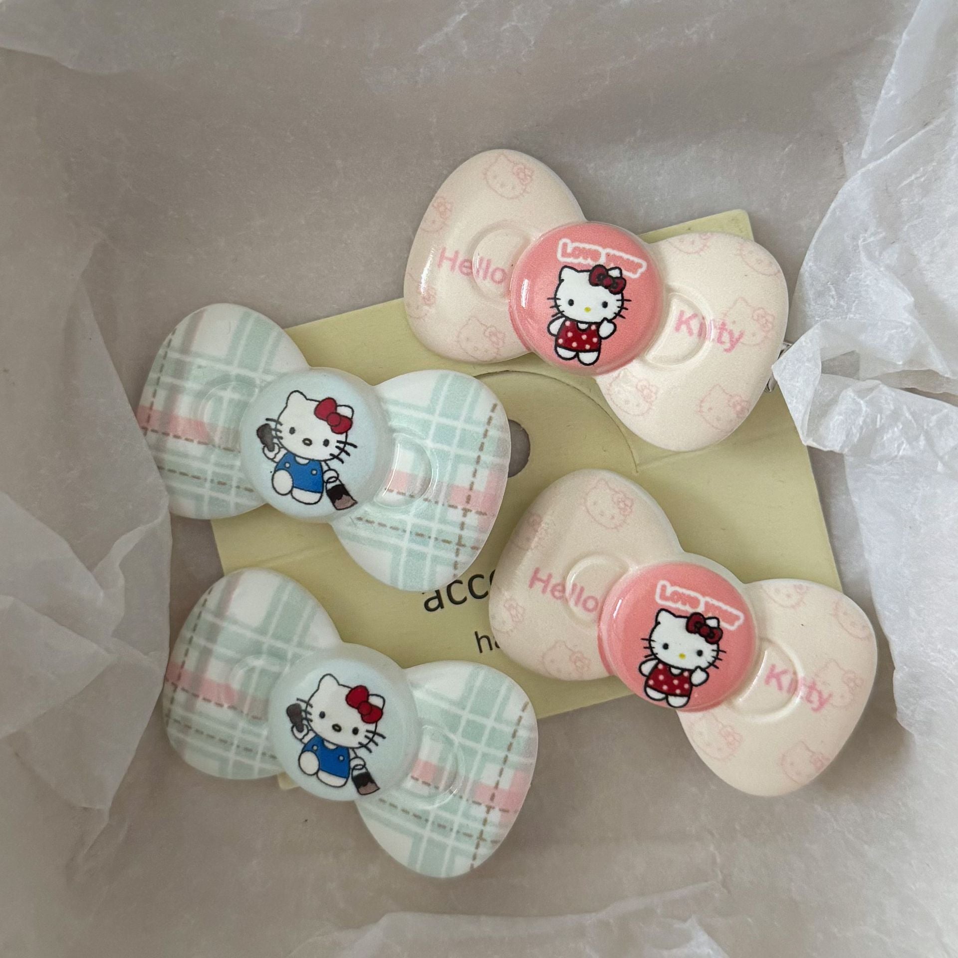 粉色貓咪領結髮夾－商品主圖｜https://igowo.tw/