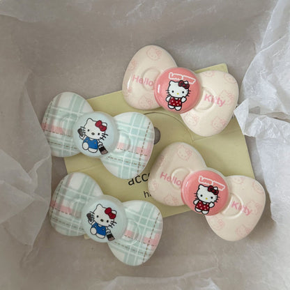 粉色貓咪領結髮夾－商品主圖｜https://igowo.tw/