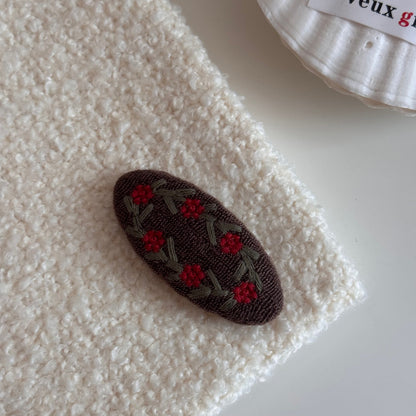 針織布面橢圓刺繡髮夾