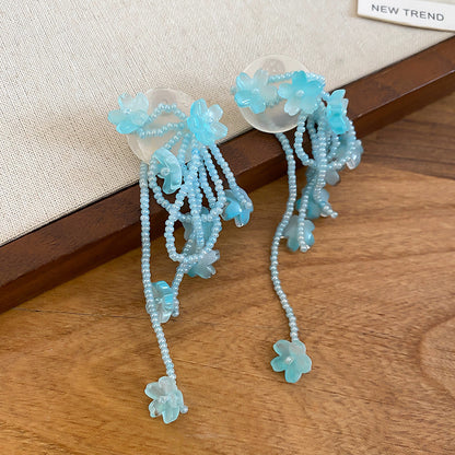 藍色樹脂花朵誇張耳環－細節特寫52｜https://igowo.tw/