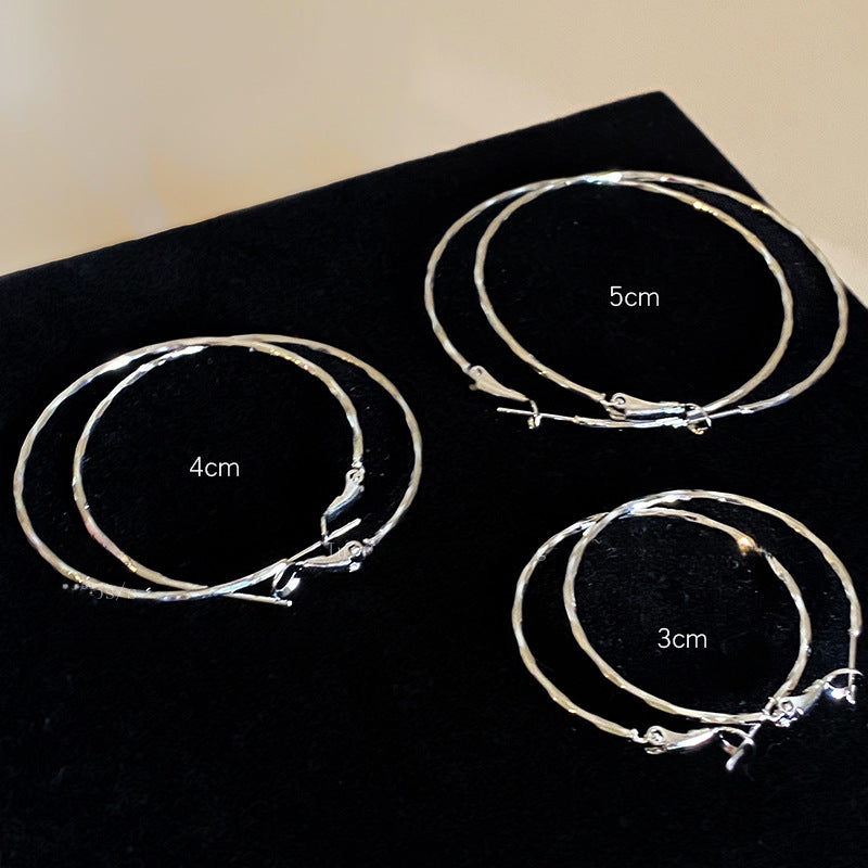 銀針素圈麻花耳環女簡約小眾高級感耳圈時尚百搭冷淡風耳飾設計感