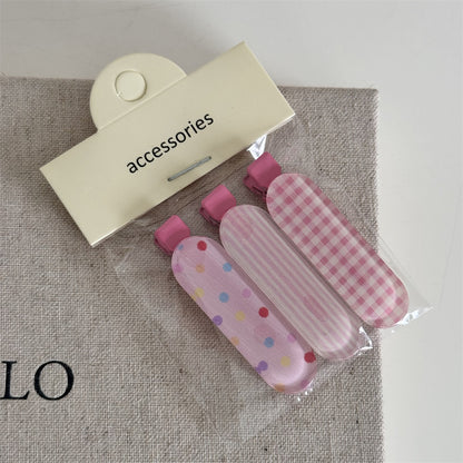 繽紛格紋髮夾－小兔一對-彩點款細節｜https://igowo.tw/