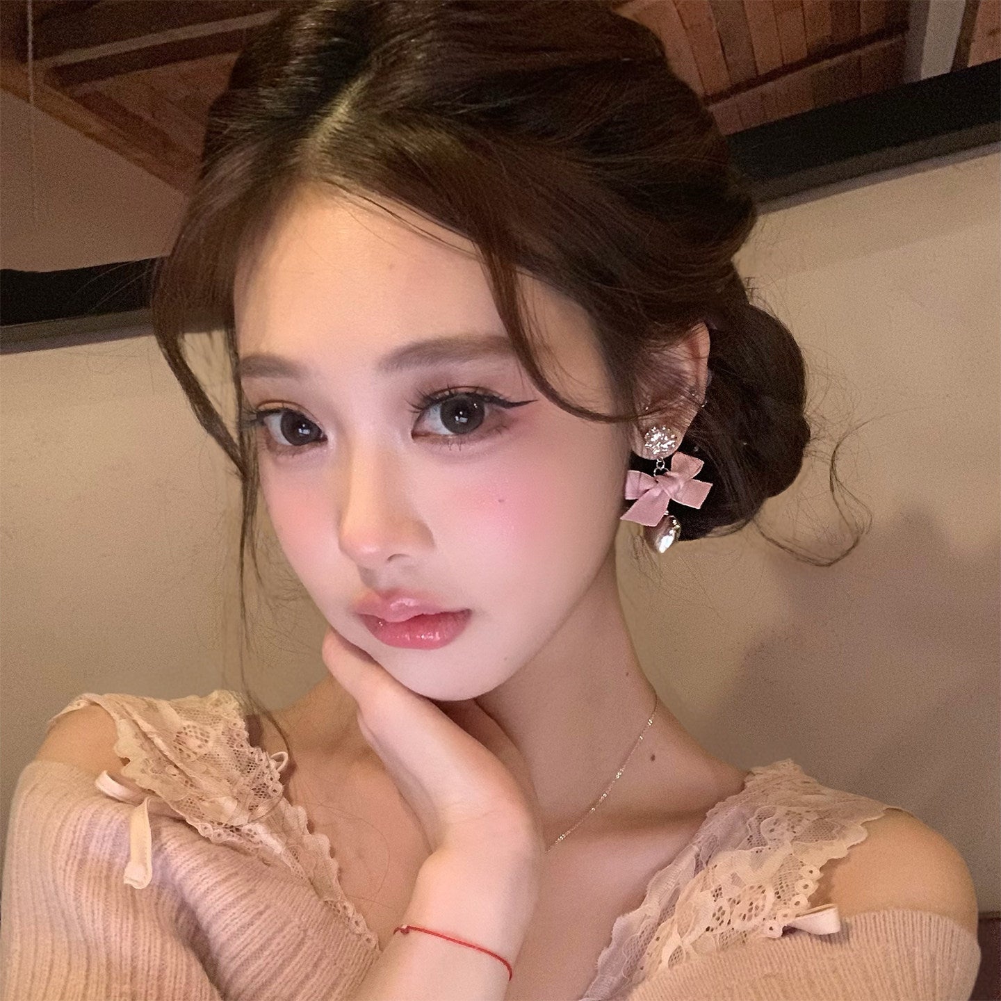 甜美粉色蝴蝶結吊墜耳釘