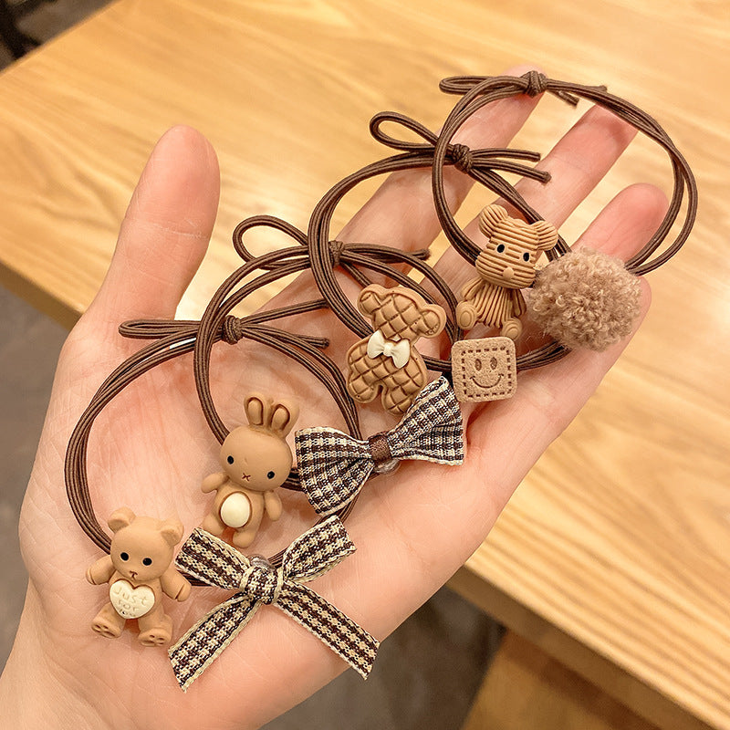 毛球蝴蝶結卡通髮圈－細節特寫1｜https://igowo.tw/