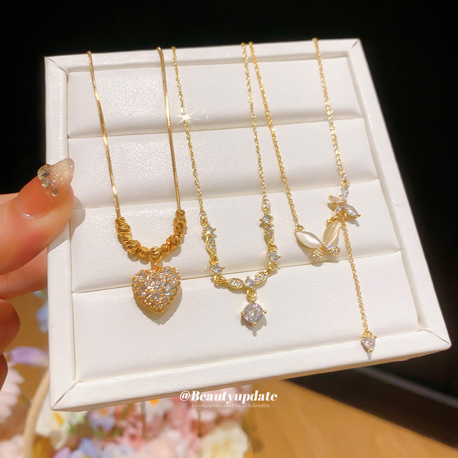 金色鋯石愛心電鍍項鍊－商品主圖｜https://igowo.tw/