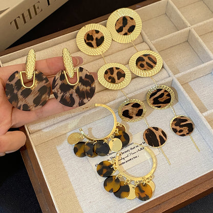 銀針豹紋波點流蘇耳環－商品主圖｜https://igowo.tw/