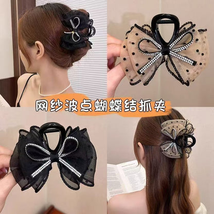 網紗蝴蝶結波點鯊魚夾－商品主圖｜https://igowo.tw/