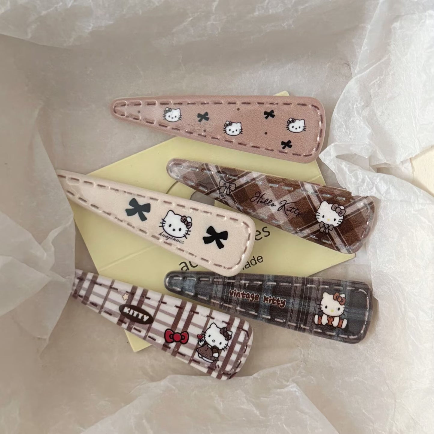 棕色貓咪水滴髮夾－商品主圖｜https://igowo.tw/