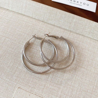 銀針圓圈誇張耳環