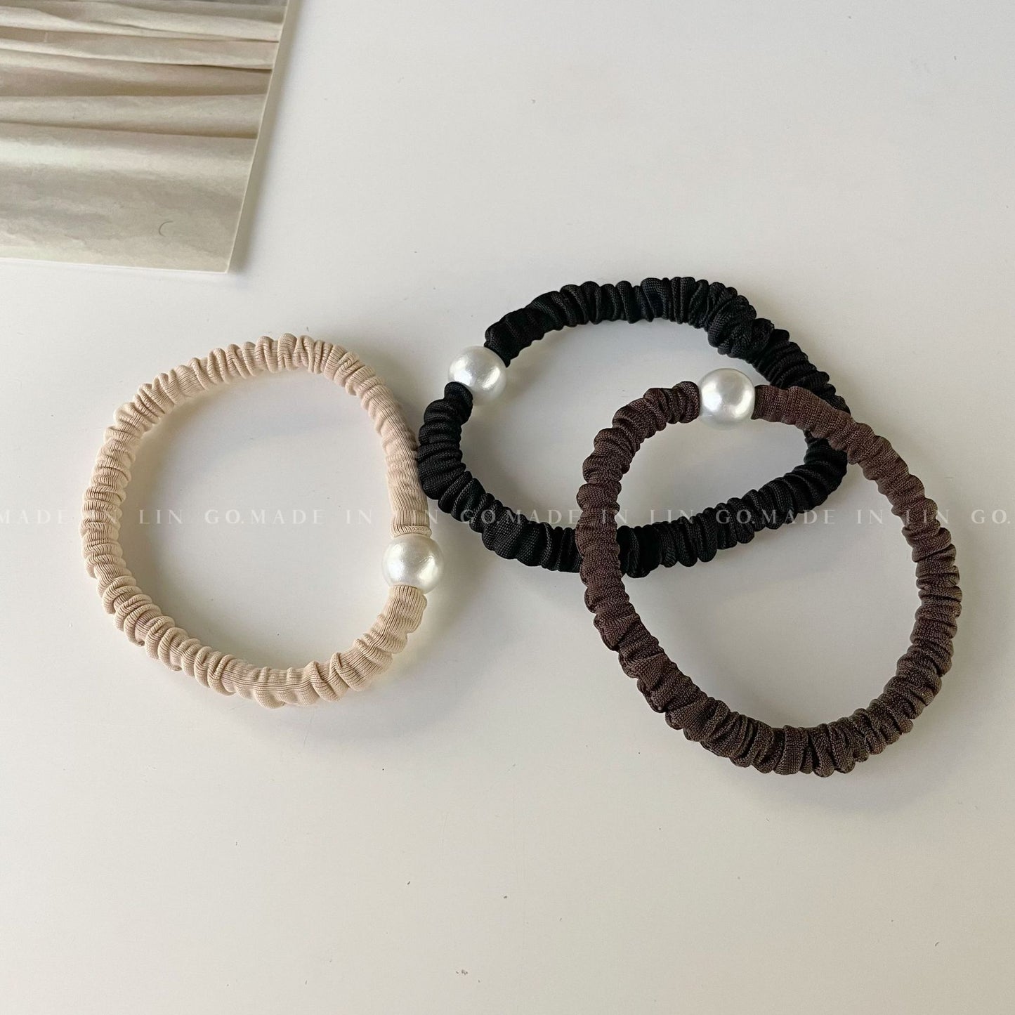 黑色珍珠髮圈－商品主圖｜https://igowo.tw/