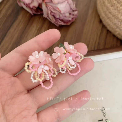 白色花朵耳環－紫款細節｜https://igowo.tw/