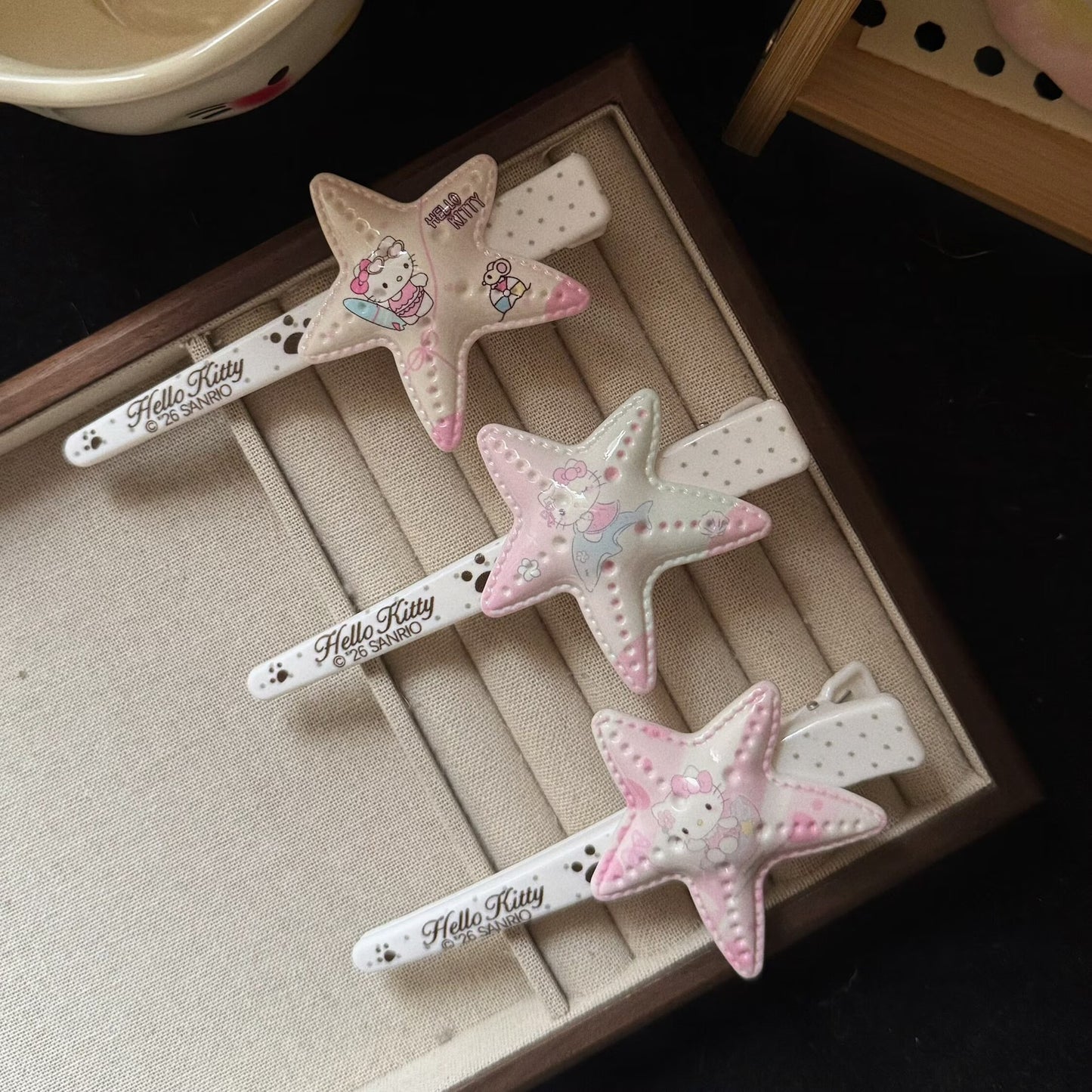 粉色海星貓咪髮夾－紫色星星大號髮夾款實拍｜https://igowo.tw/