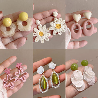 珍珠銀針花朵耳墜－細節特寫1｜https://igowo.tw/